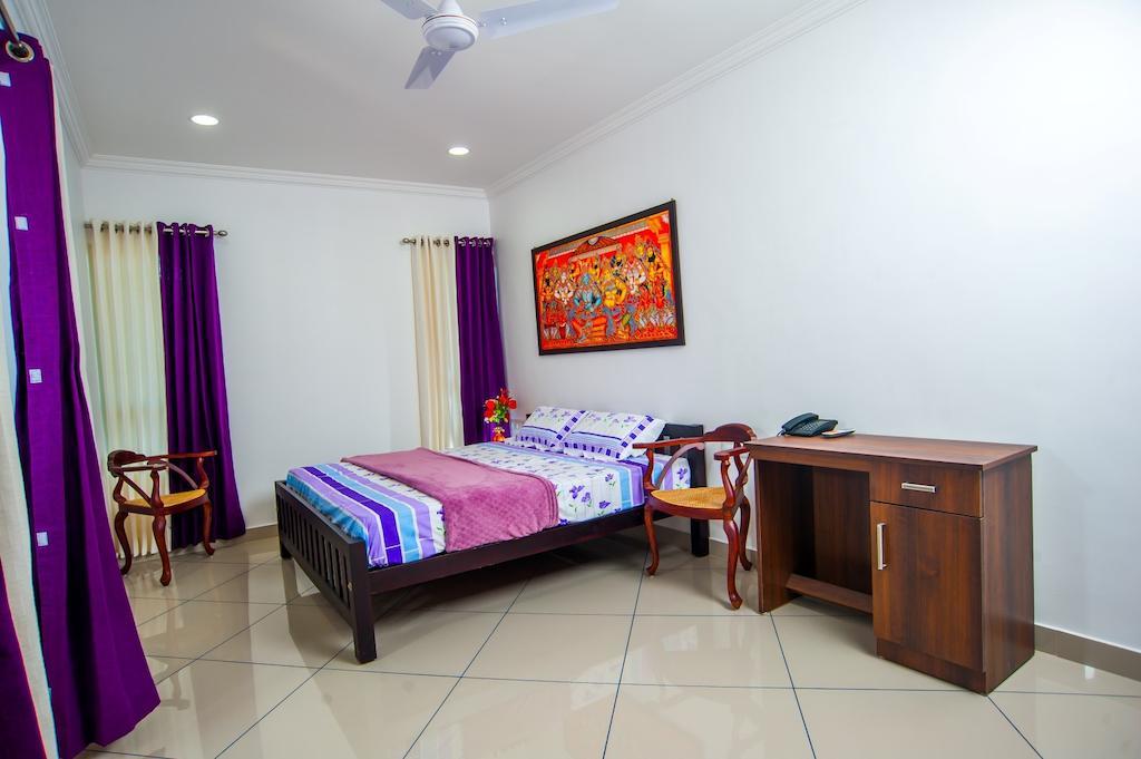 Vasudevam Premium Suites Thiruvananthapuram Pokój zdjęcie
